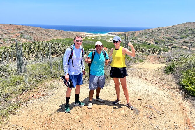 Arikok Sunrise Hiking Tour to Natural Pool + Transportation - Daimari Beach, dunes, and the sea grape forest