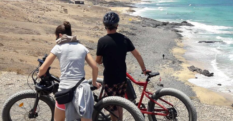 Caleta de Fuste/Corralejo: Guided E-Bike Tour & Crater Hike - Crossing the Bayuyo volcano country