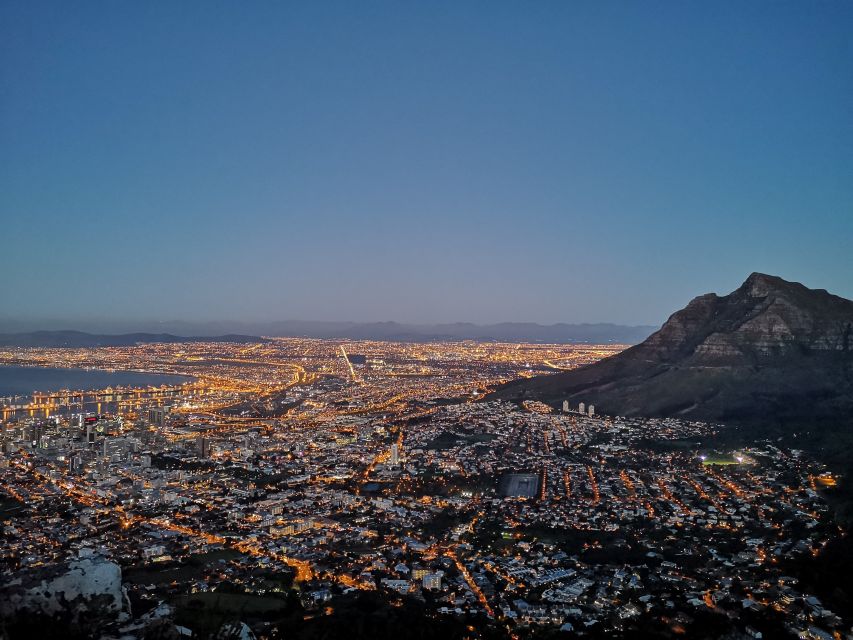 Cape Town: Lion's Head Guided Hike at Sunset - The sunset, the city lights, and the walk back
