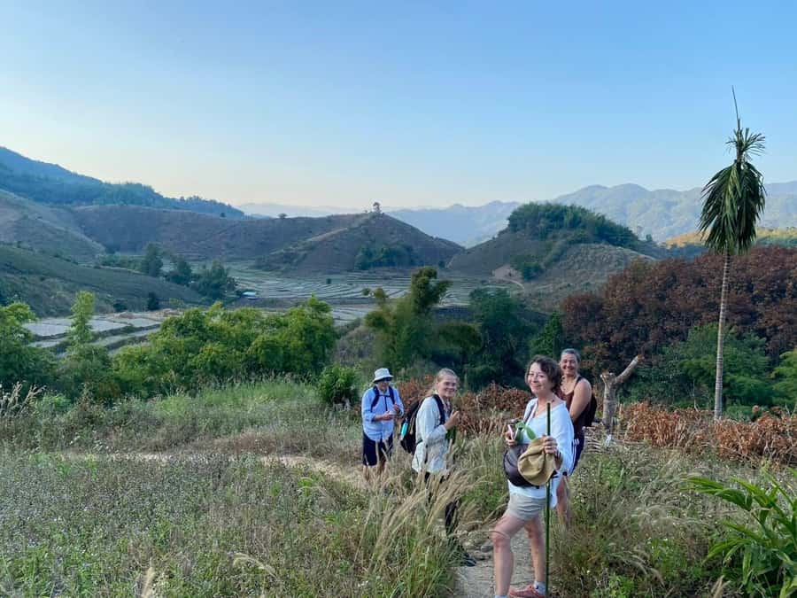 Chiang Rai: 1-Day Trekking and Longtail Boat Trip - Walking toward Huay Kaew Waterfall