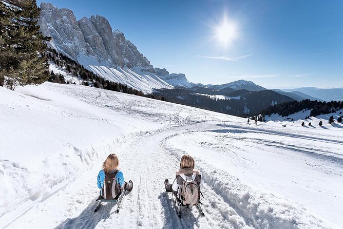 Dolomites of Bolzano Winter Hiking & Sledding Experience - What the $213.94 price really covers