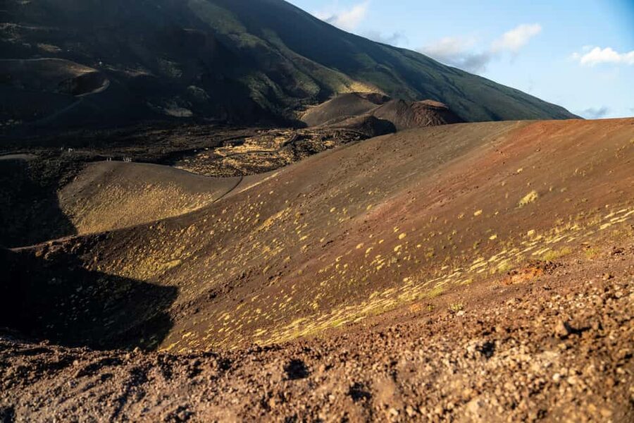 Etna Sunset Tour: Volcano trek, Cave & tasting from Catania - Walking among the craters at 1,910 meters