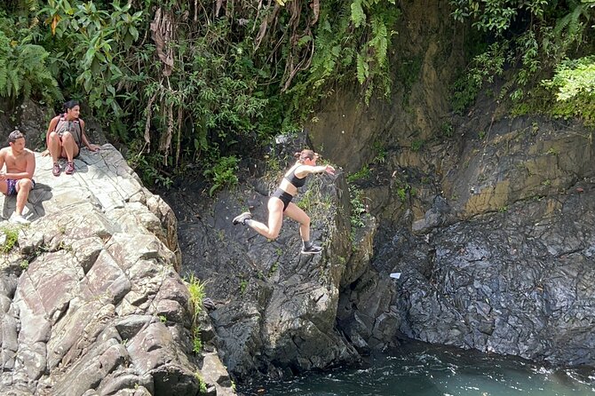 Explore El Yunque: Hiking, Swings & Waterslide (Small Group) - The volcanic-rock waterslide
