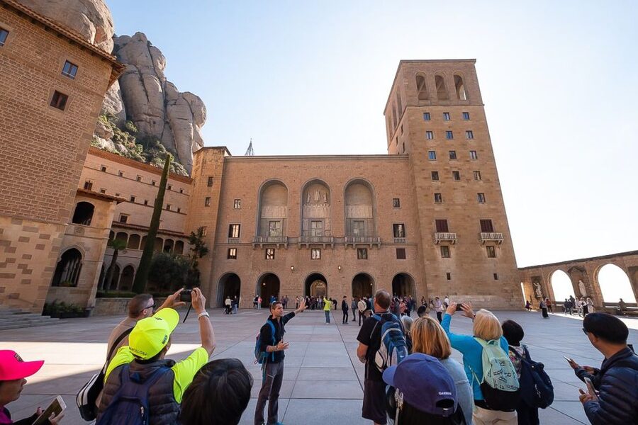 From Barcelona: Montserrat Monastery, Easy Hike, Cable Car - Riding above the rock formations