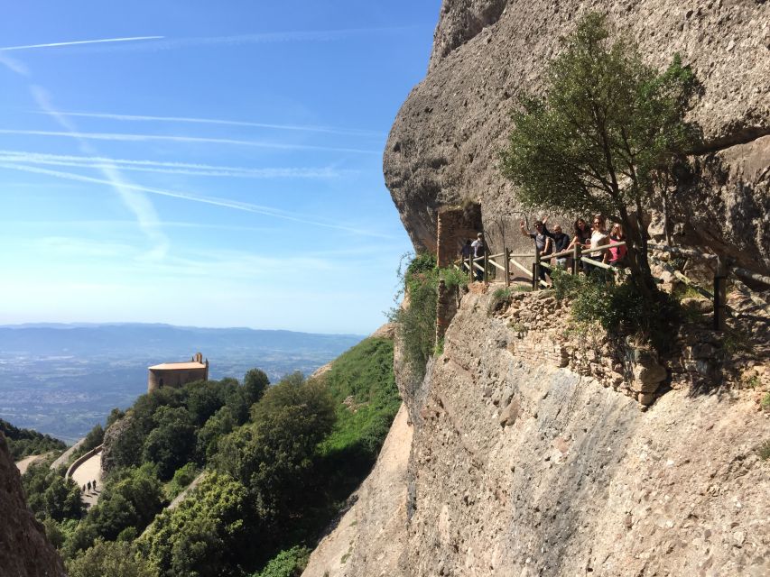 From Barcelona: Montserrat Monastery & Scenic Mountain Hike - Free time for local food and shopping