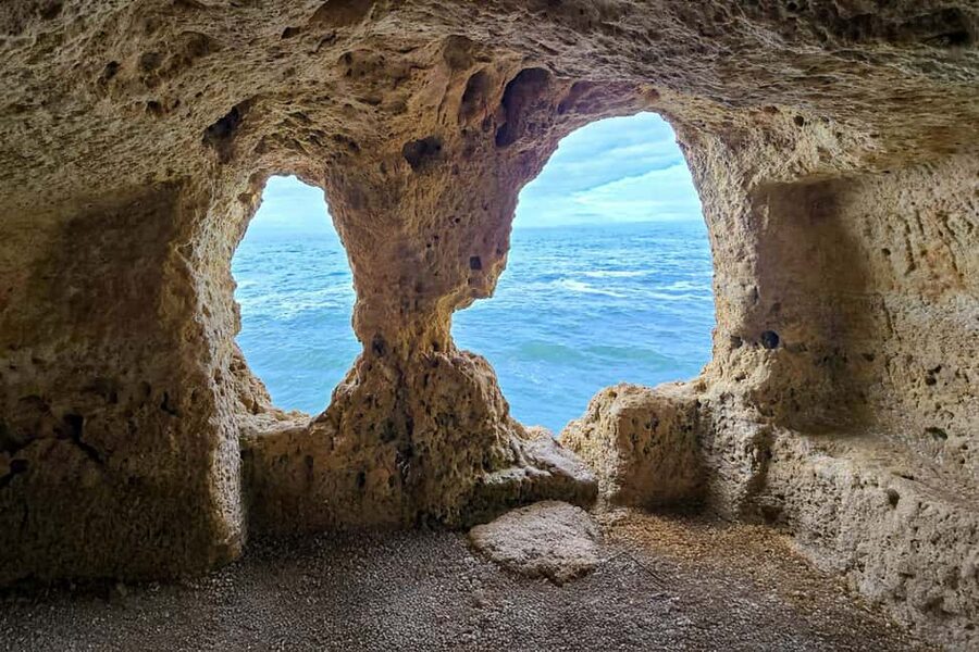 From Faro: Benagil Cliffs Hiking & 4 Treasures Experience - Looking into Benagil Cave from the cliff top