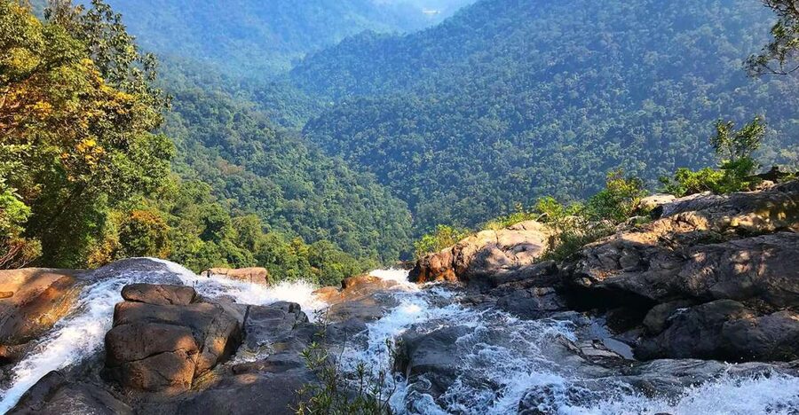 From Hue/Da Nang/Hoi An: Bach Ma National Park Trekking Tour - Do Quyen Waterfall closes the route with a dramatic view