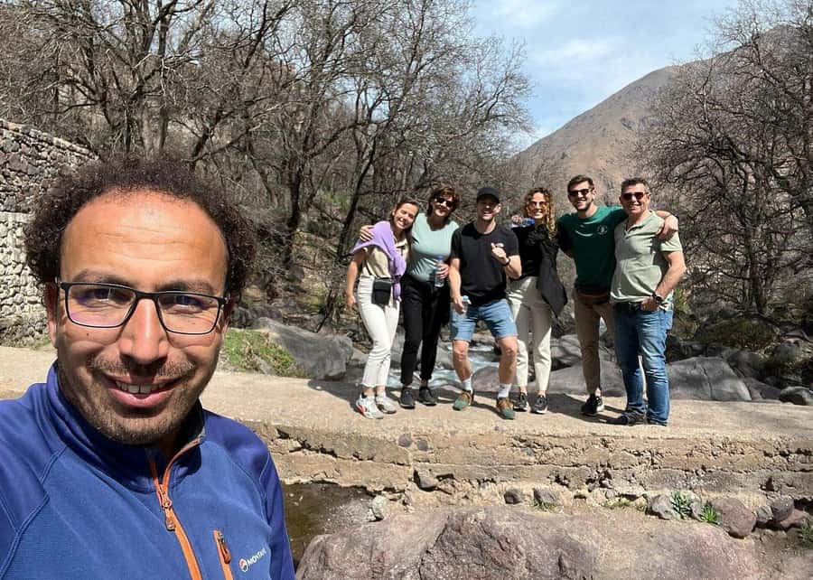 From Marrakech: Atlas Mountains Summit Trek - The descent through villages and the Tidli Plateau