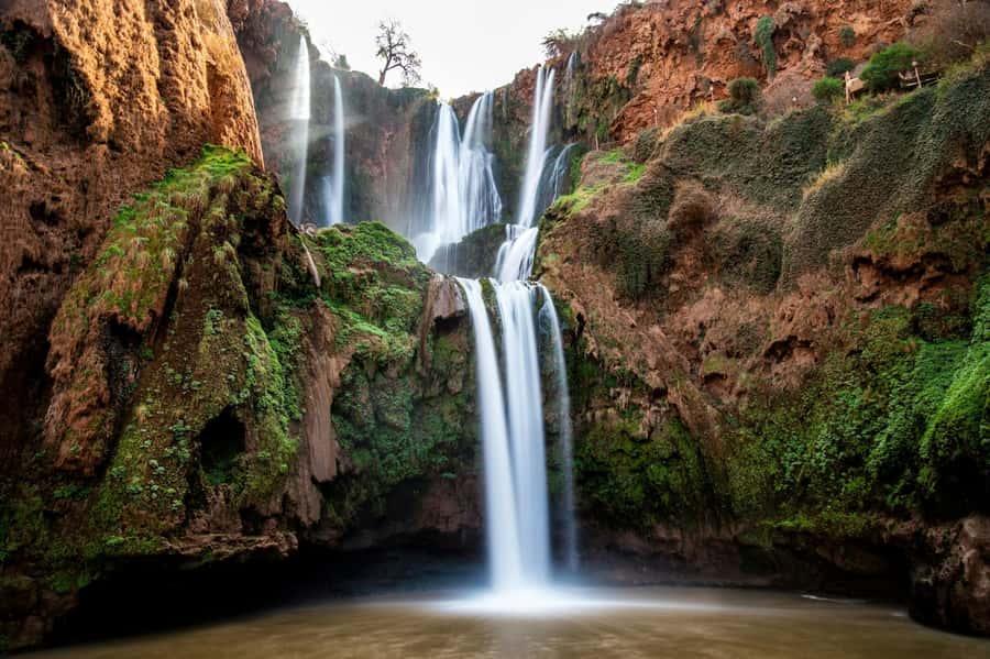 From Marrakech: Ouzoud Waterfalls Guided Hike and Boat Tour - The short boat ride beneath the falls
