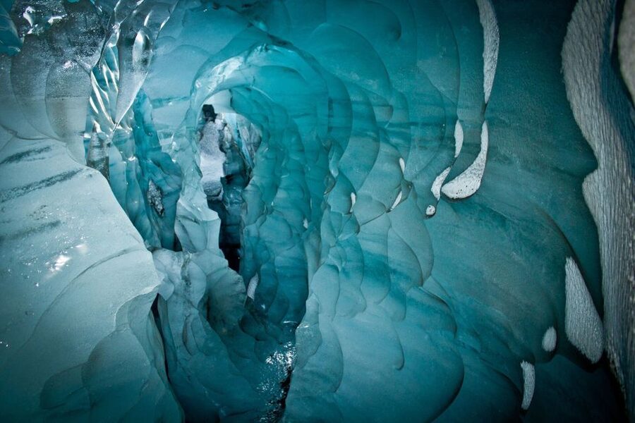 From Reykjavik: South Coast and Glacier Hiking Tour - Walking across a moving world of ice
