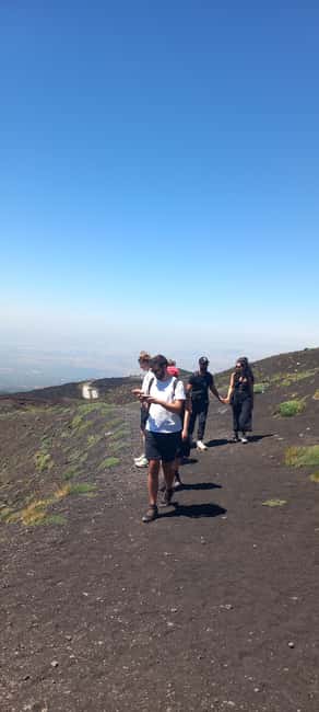 From Siracusa: Etna Tour - Trek, Wine and Food - Lava flows, craters, and a cave below the surface