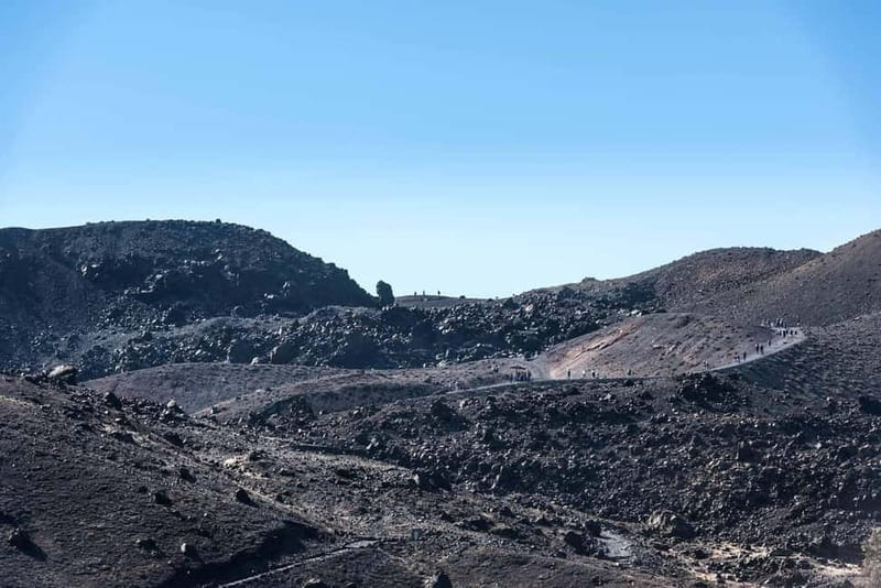 From Thera: Thirasia Cruise w/ Volcano Hike and Hot Springs - Commentary, languages, and time at the stops