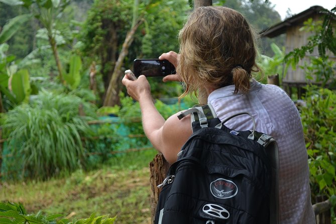 Full-Day Hike and Bike Tour from Chiang Mai - Cycling rural roads toward an orchid farm