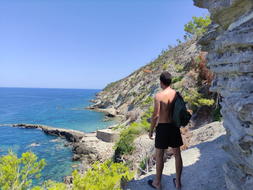 Hidden Coves, Hiking & Snorkeling Adventure in Mallorca - The first cove: rocks, caves, and clear water