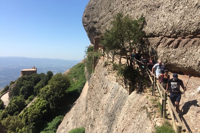 Historical Montserrat Half-Day Hiking Tour from Barcelona - Hiking through shrines, hermitages, and unusual rock