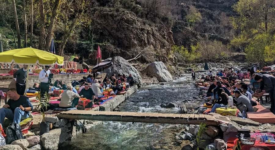 Marrakech: Ourika Valley Waterfalls Hike & Traditional Lunch - Riverside Moroccan lunch and a point to clarify