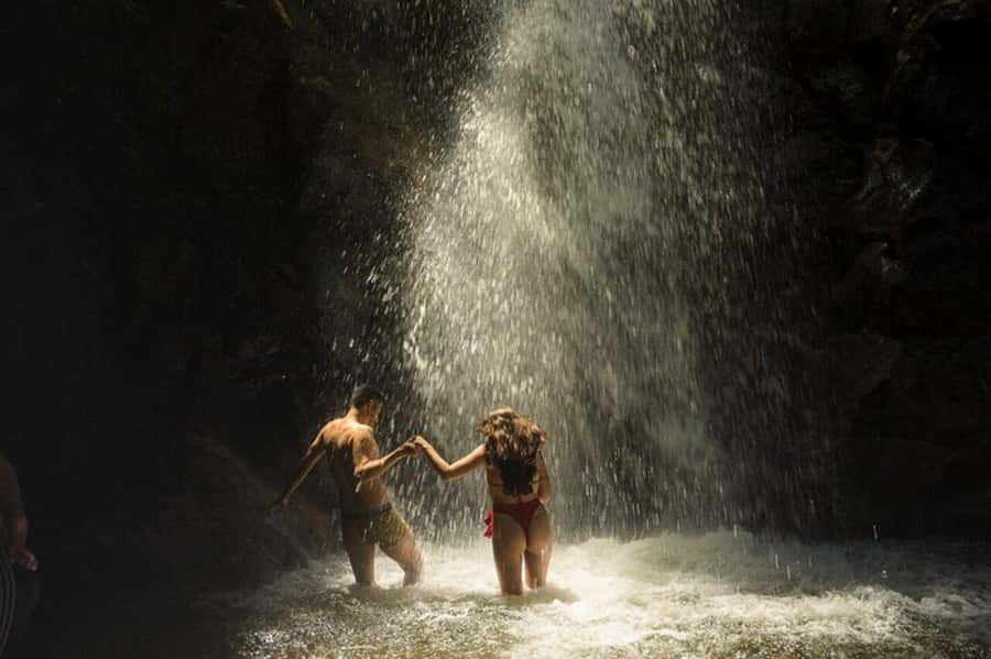 Medellín: Secret Waterfall Hike Tour with Snack and Coffee - What to pack for wet rocks and a cold swim