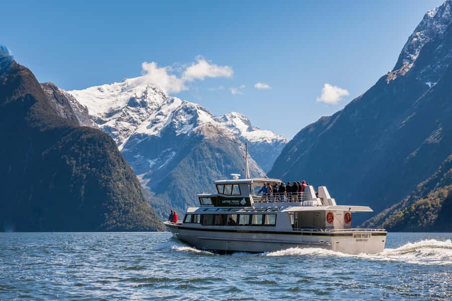 Milford Track: Full Day Guided Hike and Nature Cruise - What the guide adds to the price