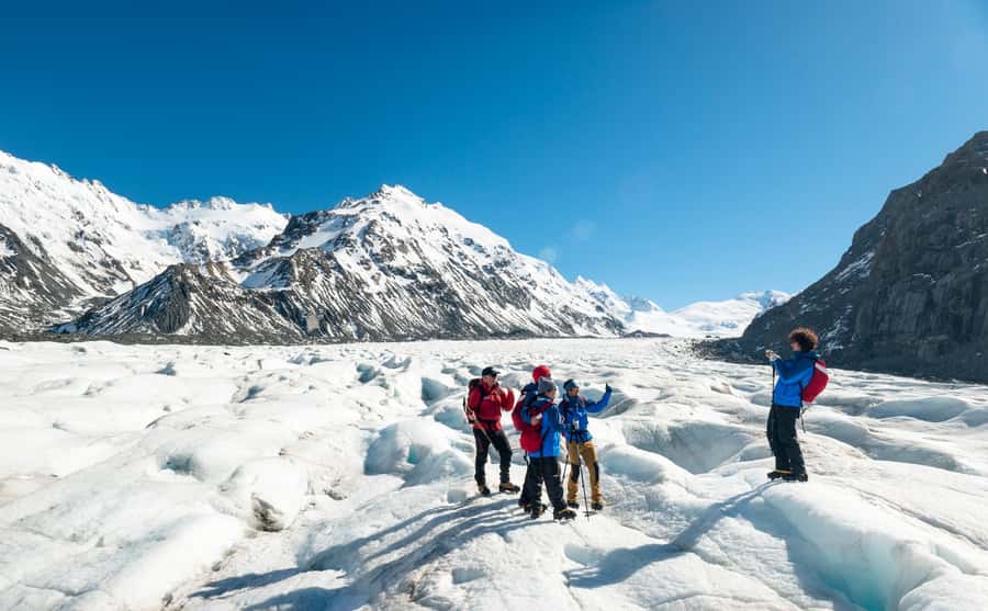 Mount Cook: 3-Hour Tasman Glacier Helicopter Ride and Hike - Walking among blue ice, moulins, and caves