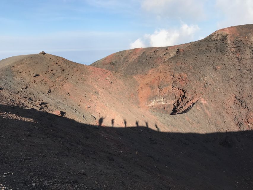 Mount Etna: Craters of the 2002 Eruption Trekking Experience - The walk back through volcanic sand