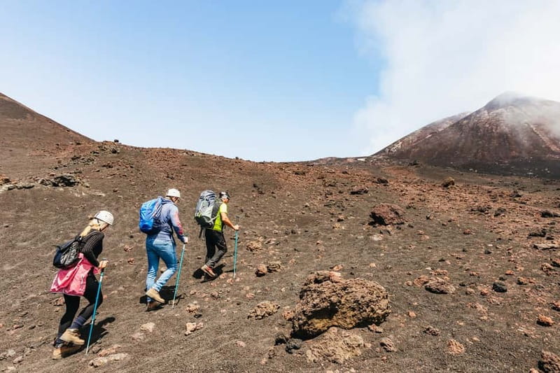 Mount Etna: scenic Summit Trek with a volcano Guide and Gear - Descending through recent eruption craters