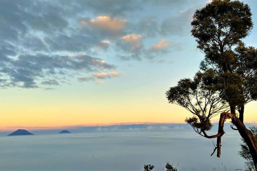 Mount Merbabu Hiking Tour 2D1N With Camping - Sunset above Andong and Telomoyo