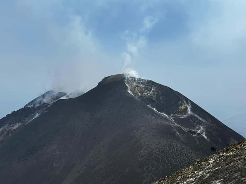 Nicolosi: Mount Etna Central Crater Guided Trekking Tour - Ancient cones and broad lava fields