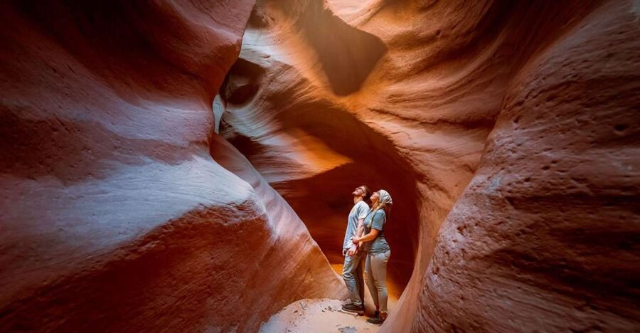 Orderville: East Zion UTV Ride and Red Rock Slot Canyon Hike - Walking into the narrow red rock canyon