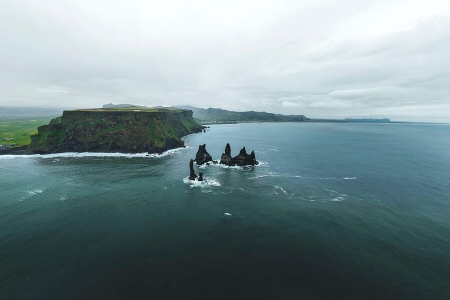Reykjavik: Glacier Hike & South Coast Day Tour - Reynisfjara combines black sand and real danger
