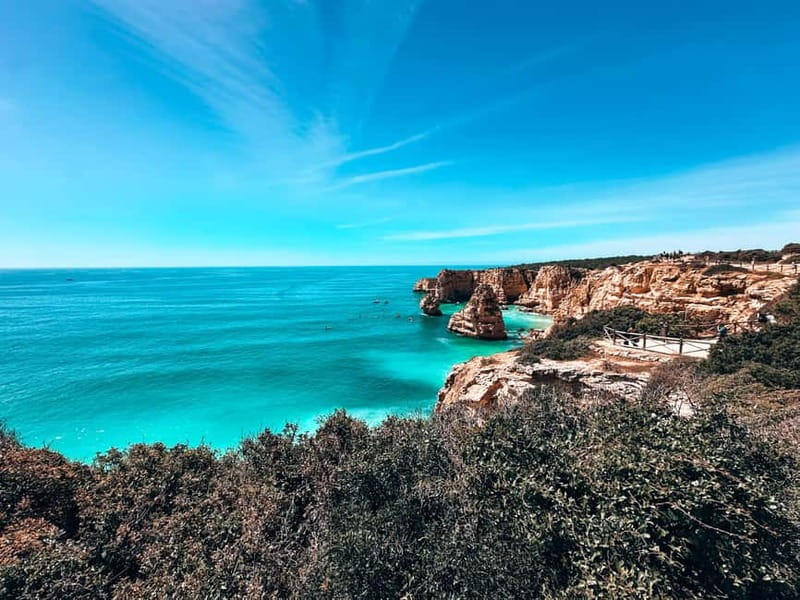 The Original 7 Hanging Valleys Guided Hike With Pickup - Praia da Marinha is the grand finish